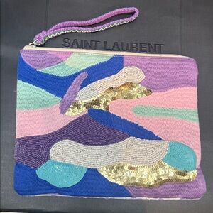 America & Beyond Purple wristlet